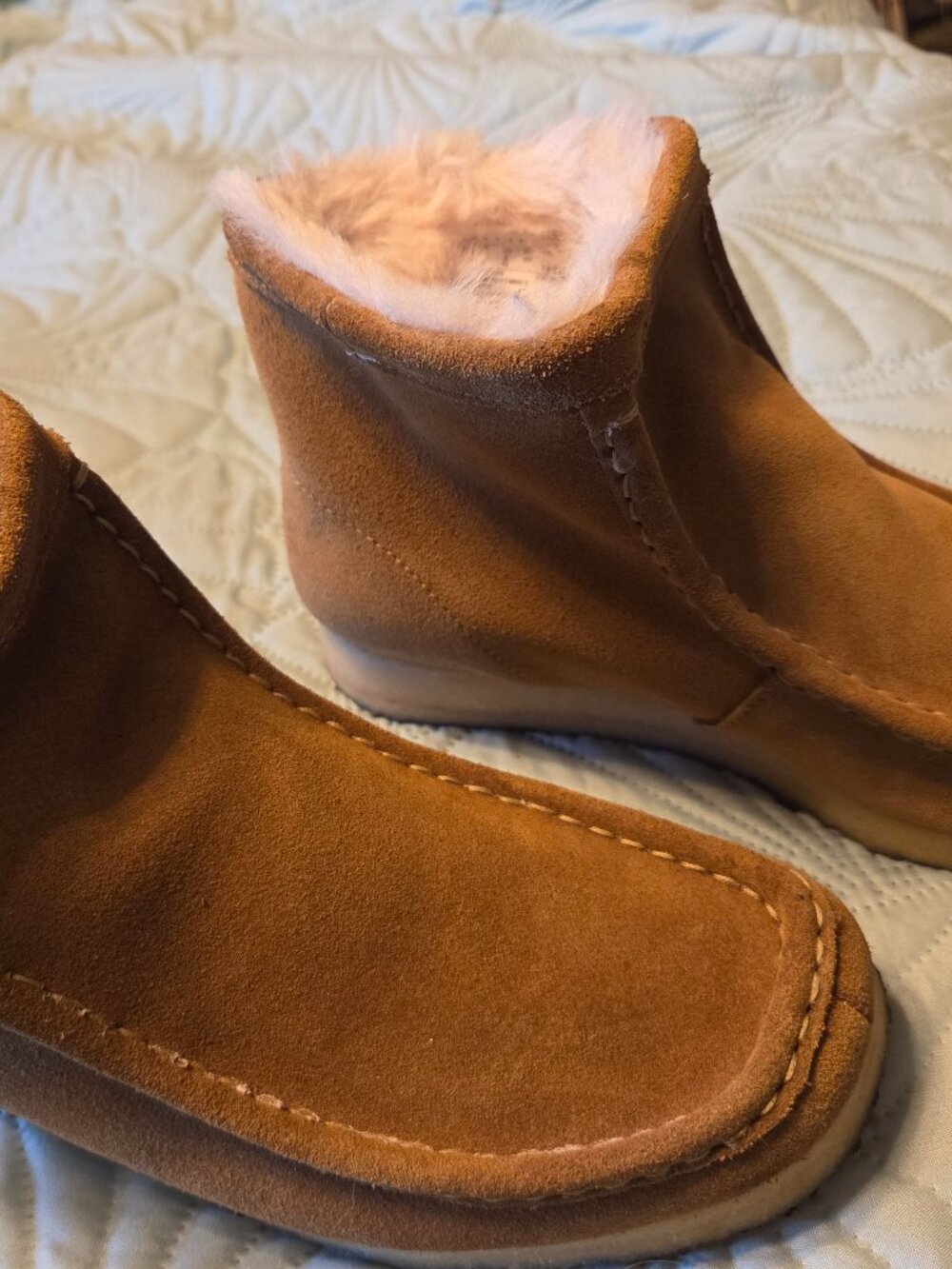 Clark's fur lined boots. Made in Portugal.